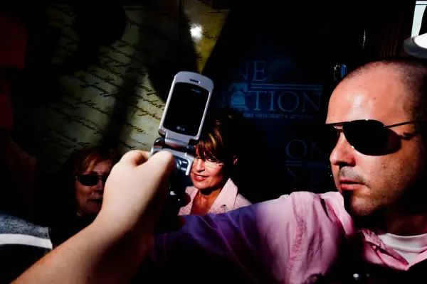 Sarah Palin and a staff member, right, talks to fans during her visit to Gettysburg, PA, Tuesday, May 31, 2011.
