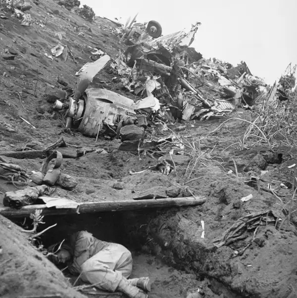Amid the Carnage of Iwo Jima, Shelter and Sleep
              
              During the 35-day battle in Feburary and March of 1945 on Iwo Jima, a man finds refuge and sleep amid the wreckage that covers the island.