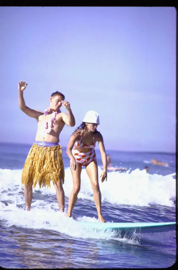 A beginner surfing at Waikiki Beach.