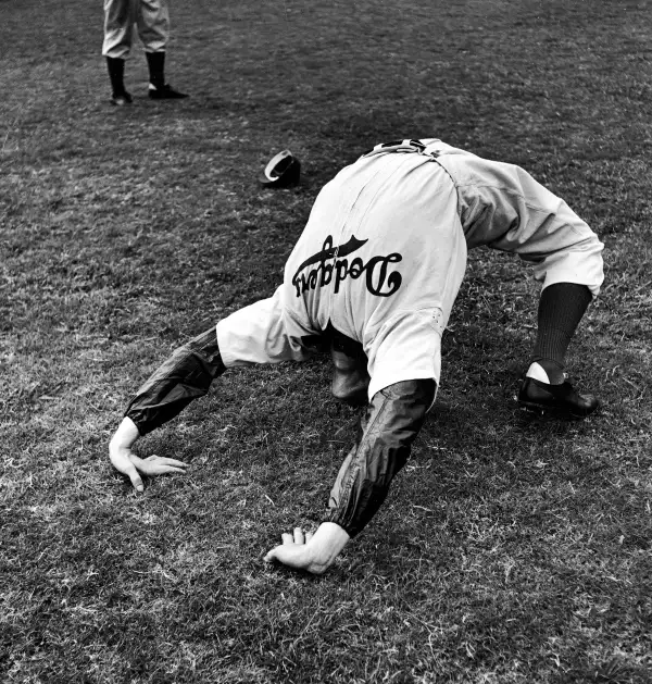 Ed Albosta does a backbend to limber up during the 1942 spring training in Havana.