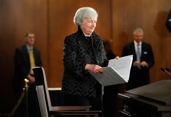 Federal Reserve Chair Janet Yellen arrives for a news conference at the Federal Reserve in Washington