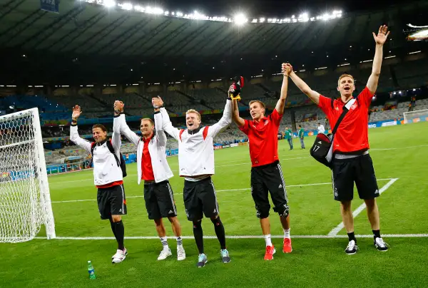 Germany's national soccer players Roman Weidenfeller, Shkodran Mustafi, Andre Schuerrle , Kevin Grosskreutz and Per Mertesacker celebrate