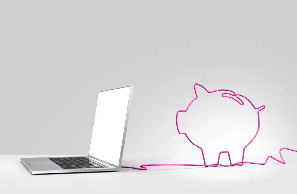 Laptop with cord in shape of piggy bank