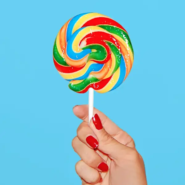 Hand holding large lollipop