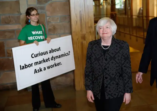 At Jackson Hole, Yellen is greeted by demonstrators who want the Fed to push for more jobs