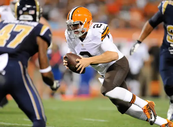 Johnny Manziel #2 of the Cleveland Browns scrambles for a touchdown during the third quarter against the St. Louis Rams at FirstEnergy Stadium on August 23, 2014 in Cleveland, Ohio.