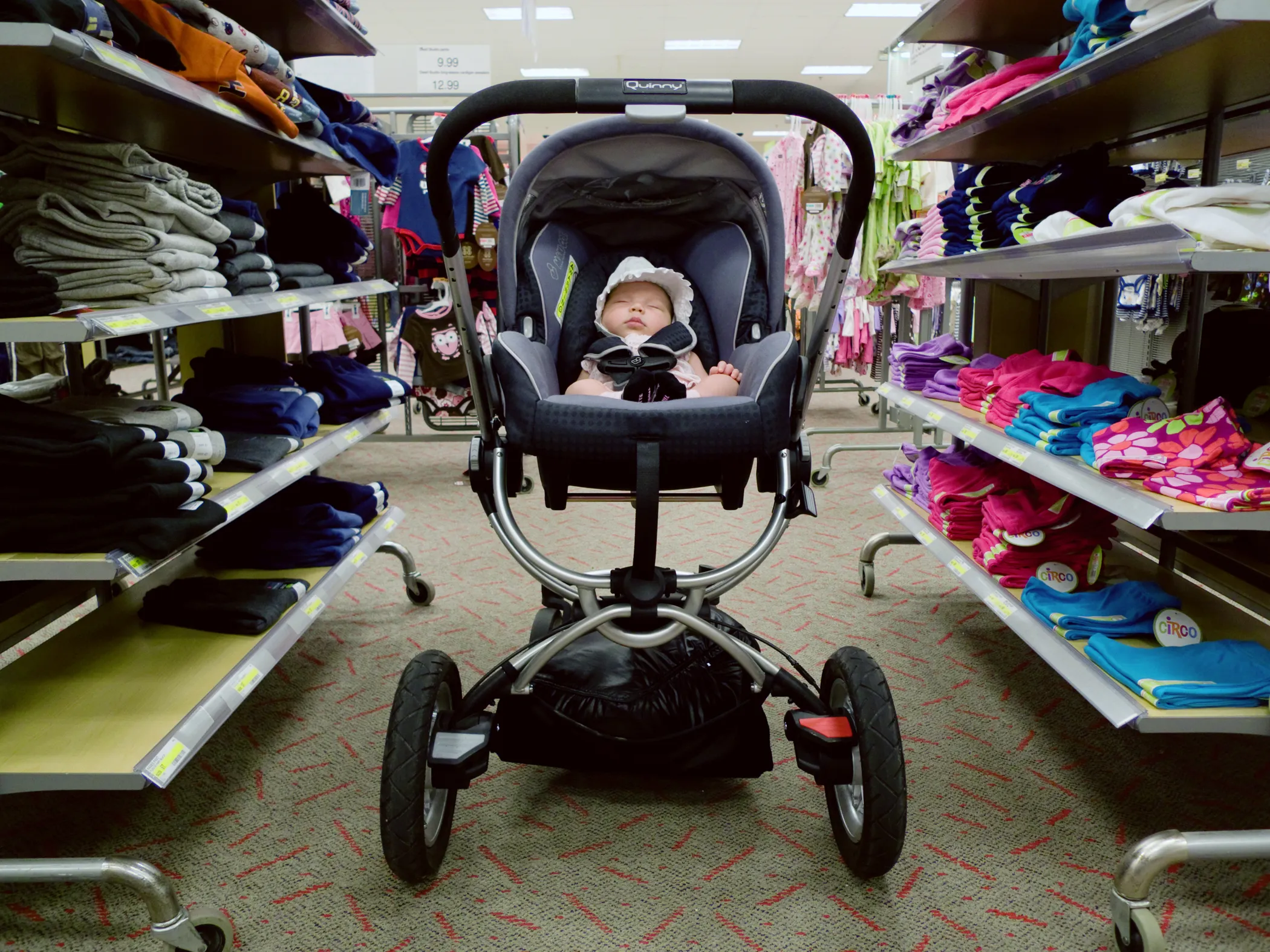 Parents will spend more than $16,000 per year to raise a child in the first two years, as recorded by the USDA 2013 Expenditures on Children by Families Report. The same study shows average of $245,340 ($304,480 adjusted for projected inflation) is spent raising a child born in 2013 to age 17, and clothing accounts for 6% of those costs.
            
            Title:  Untitled,  from the series The Reluctant Father.
            
            Phillip Toledano's daughter, Loulou, was born on July 19th, 2010. Like a lot of men, he was neither ready nor vastly enthused. Over a year and a half, he chronicled his journey from misery to joy in The Reluctant Father (Dewi Lewis, 2013).