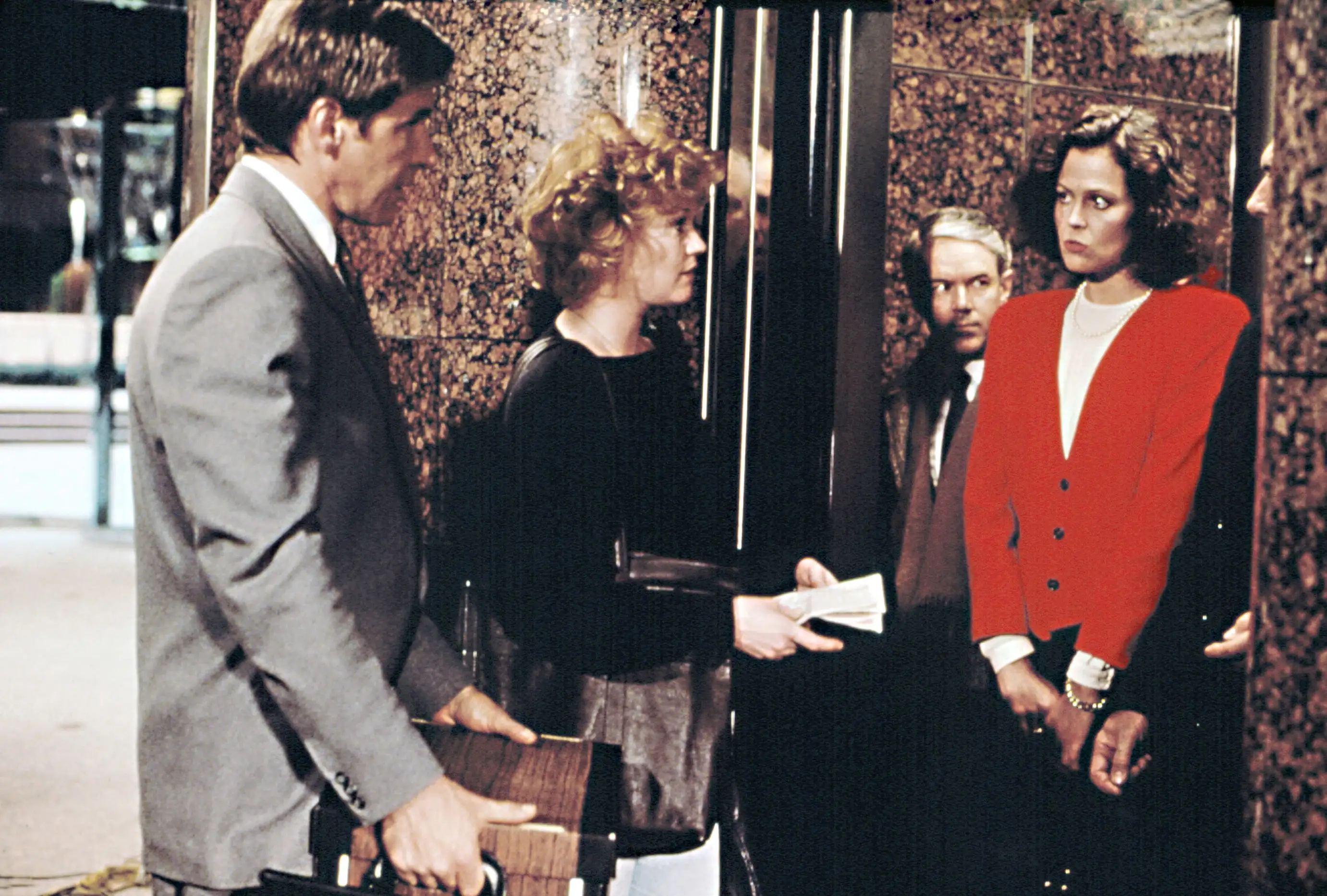 WORKING GIRL, Harrison Ford, Melanie Griffith, Sigourney Weaver, 1988.