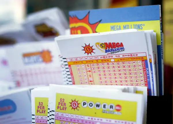 Lottery forms on a gas station counter in Lutherville-Timonium, Maryland, Thursday, Dec. 12, 2013.