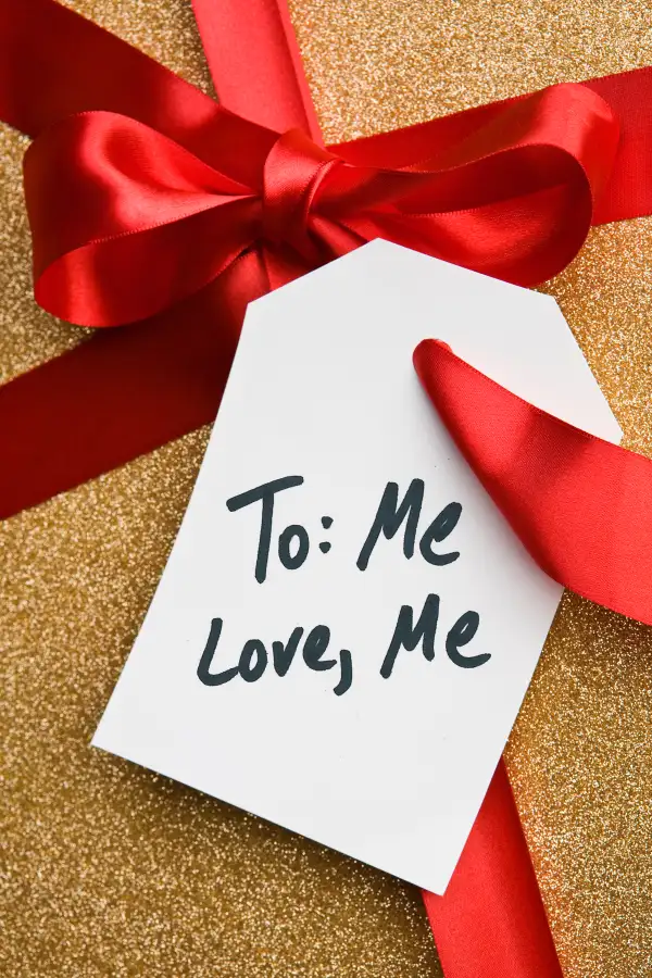 Gift with tag that reads  To: Me. Love, Me