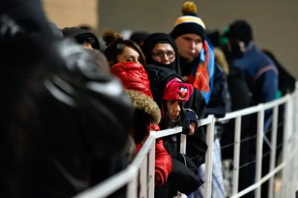 Customers wait in line outside a Target Corp. store ahead of Black Friday in Chicago, Illinois, U.S., on Thursday, Nov. 28, 2013.