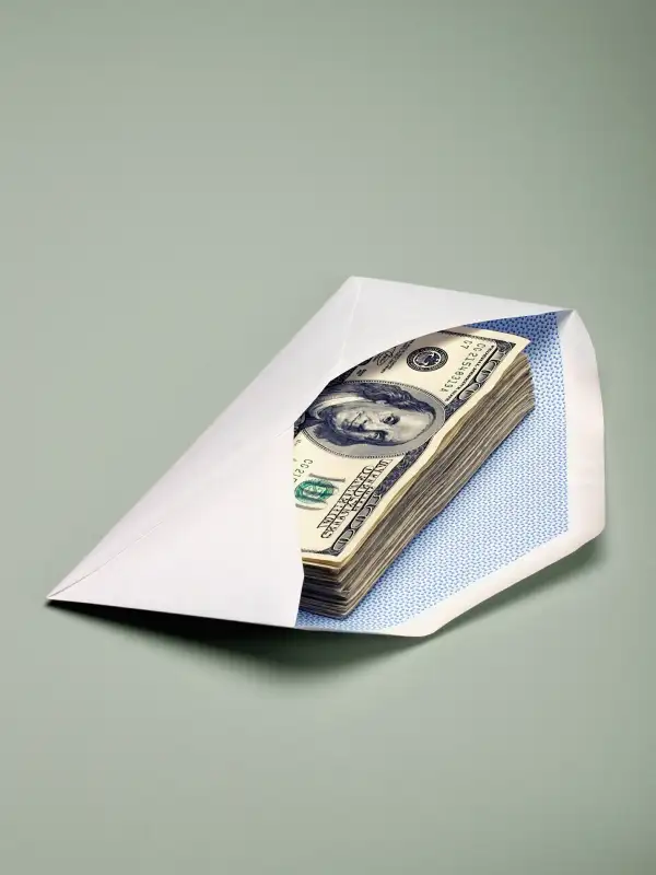 envelope with $100 bills