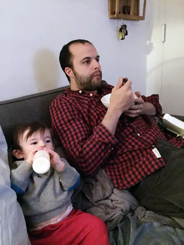 Father and son sharing a meal.