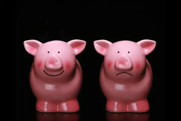 happy and sad piggy banks