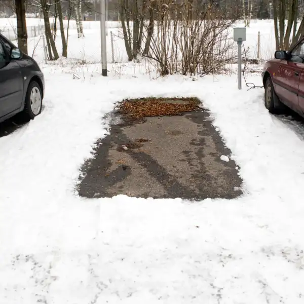 empty parking space and snow