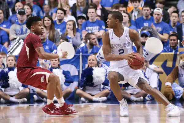 Kentucky Wildcats guard Aaron Harrison (2) looks for a way around Arkansas Razorbacks guard Anton Beard (31) during the Arkansas Razorbacks versus the Kentucky Wildcats championship game in the 2015 SEC Men's Basketball Tournament at Bridgestone Arena in Nashville, TN.