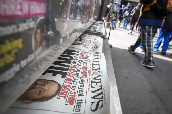 Copies of the New York Daily News are displayed on a newsstand in New York's Times Square