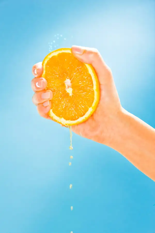 squeezing orange