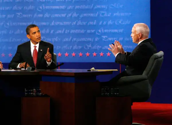 U.S. Democratic presidential nominee Sen. Barack Obama (D-IL) (L) makes a point to Republican presidential nominee Sen. John McCain (R-AZ) during the presidential debate at Hofstra University in Hempstead, New York October 15, 2008.