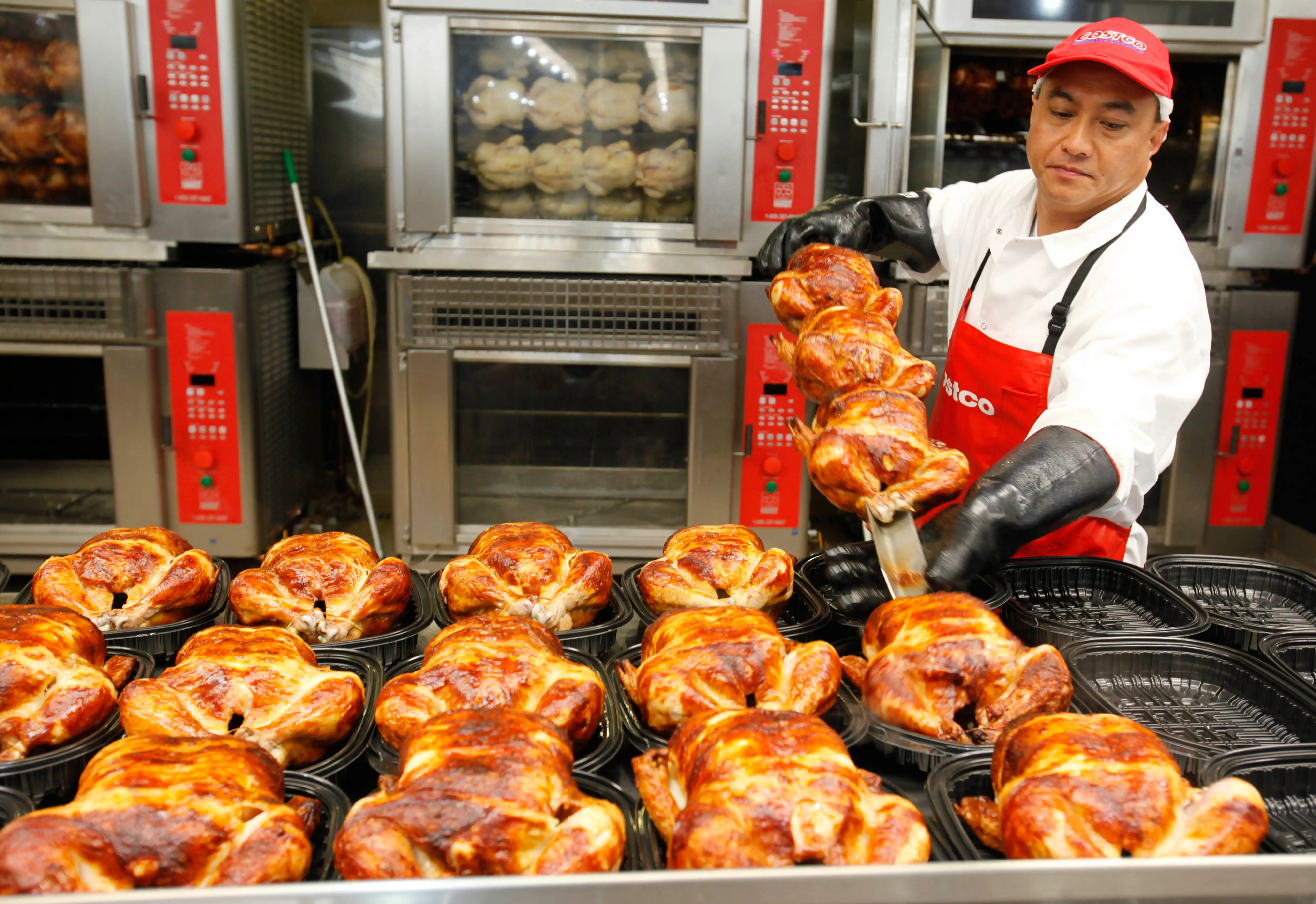 Costco worker cooks chicken at Costco in Mountain View, California