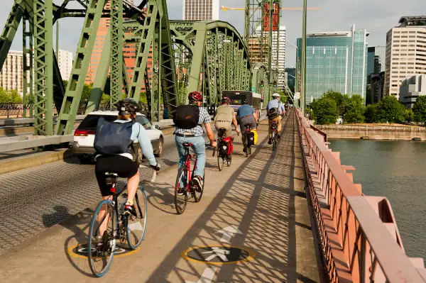 Bicycle commuters crossing the Hawthorne Bridge.