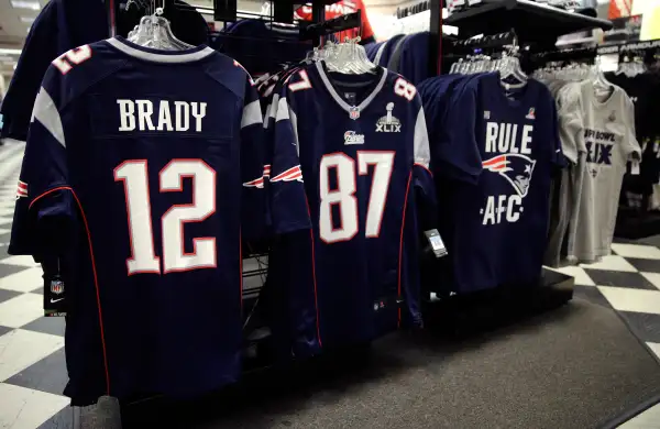New England Patriots quarterback Tom Brady's jersey on the rack at the Olympia Sports store in Medford, Massachusetts.