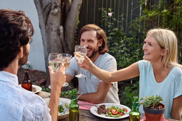 backyard dinner party with wine