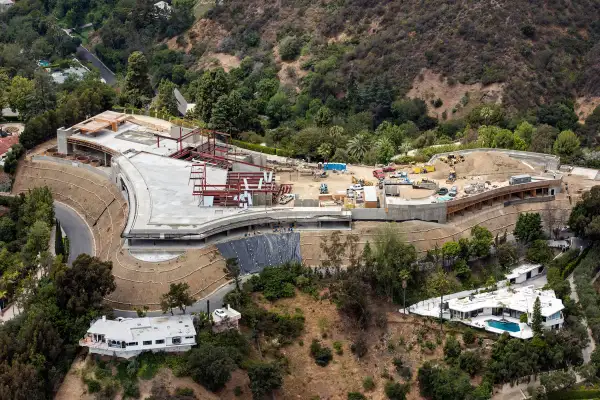 Construction continues at a home being built by Nile Niami, a film producer and speculative residential developer, in this aerial photograph taken in Bel Air, California, U.S., on Monday, May 18, 2015. Niami, who hopes to sell the house for a record $500 million, is pouring concrete in L.A.s Bel Air neighborhood for a compound with a 74,000-square-foot (6,900-square-meter) main residence and three smaller homes, according to city records.