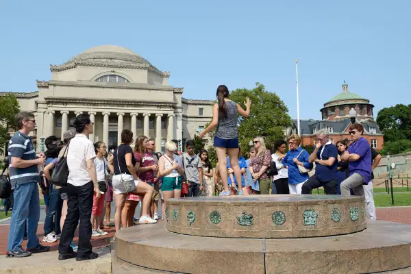 A student leader gives an admissions tour in the center of campus, Columbia University