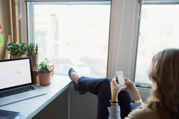 woman texting on mobile phone