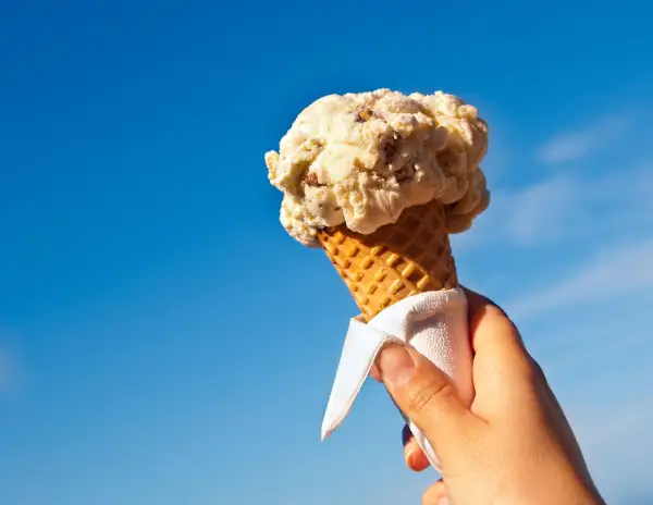 hand holding ice cream cone