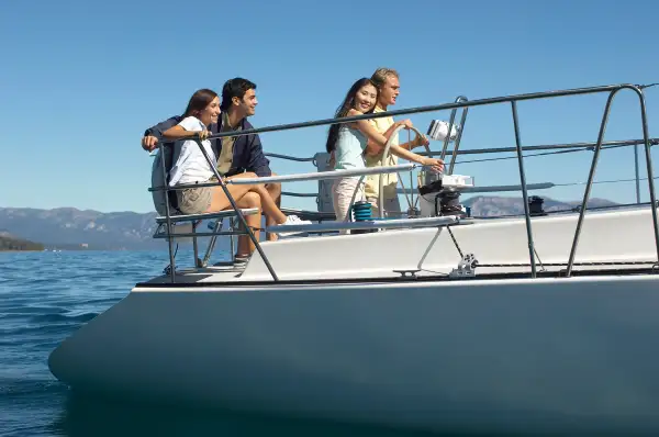two couples on a yacht