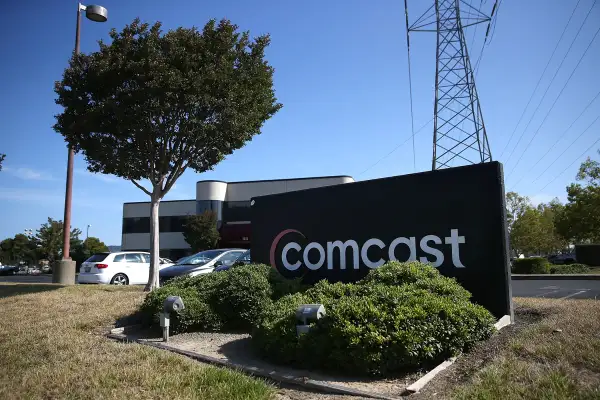 A sign is posted in front of a Comcast service center on July 13, 2015 in San Rafael, California.