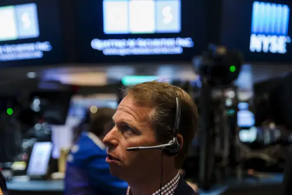 A trader works on the floor of the New York Stock Exchange shortly after the opening bell in New York August 27, 2015.