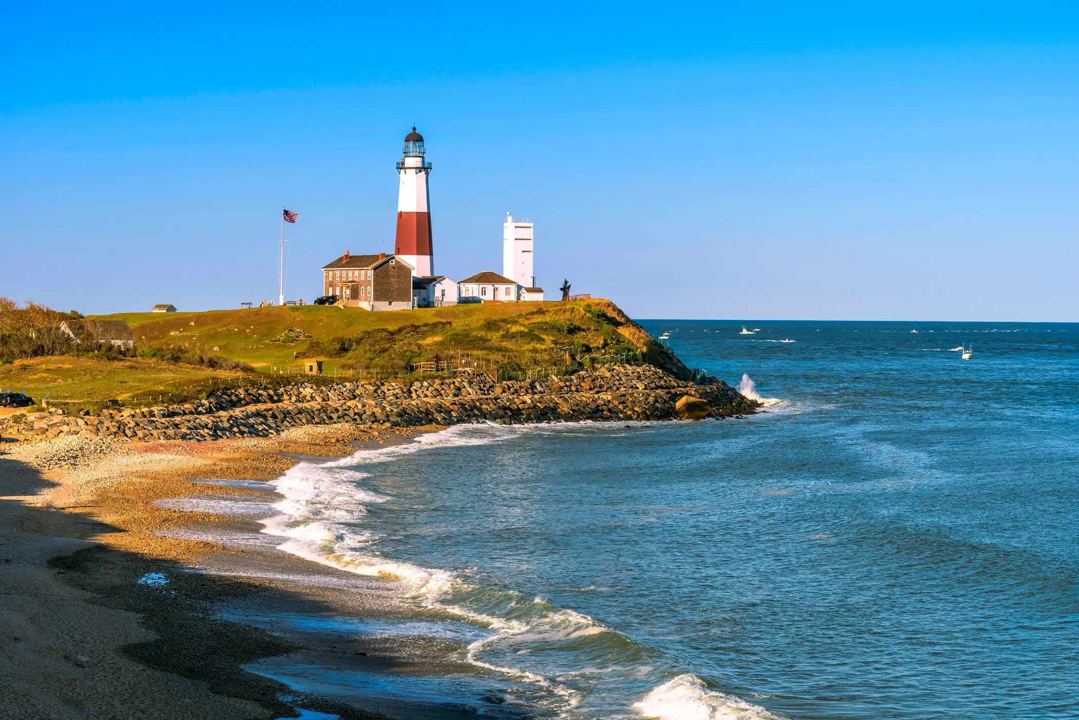 Montauk Point Lighthouse and beach from the cliffs of Camp Hero. Long Island, New York