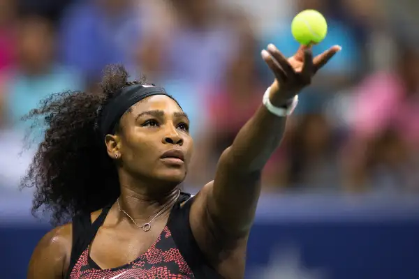 Serena Williams serves to her sister and compatriot Venus Williams during their quarterfinals match at the U.S. Open Championships tennis tournament in New York, September 8, 2015.