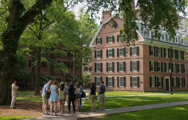 A tour group makes a stop at Connecticut Hall on the Yale University campus in New Haven, Connecticut, U.S., on June 12, 2015.