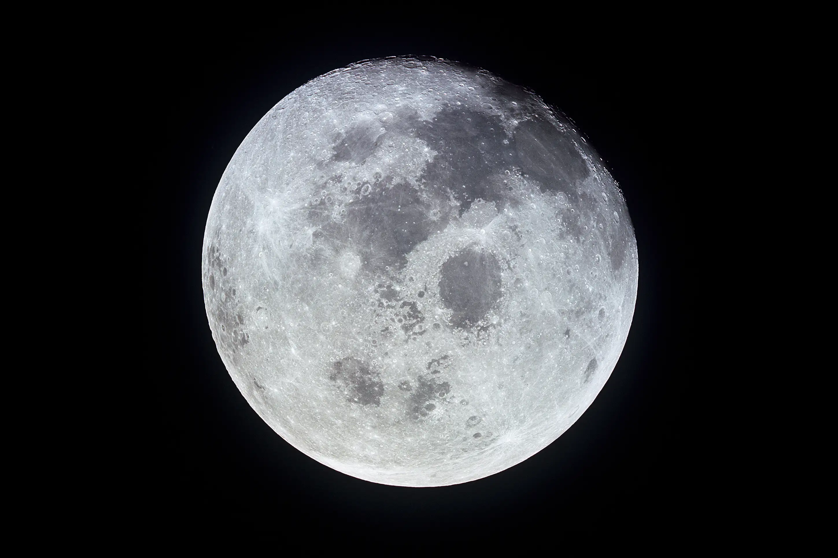 View of the full moon photographed from the Apollo 11 spacecraft during its trans-Earth journey homeward.