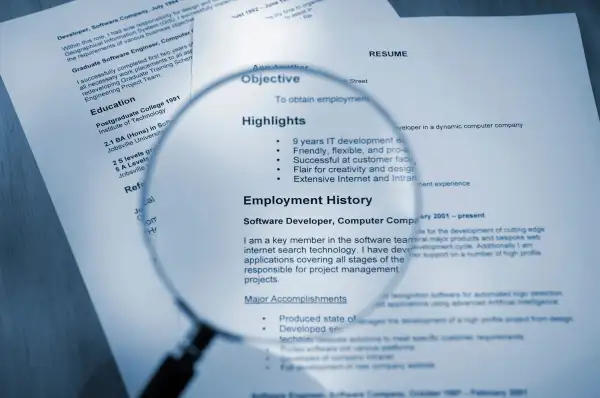 magnifying glass over resume