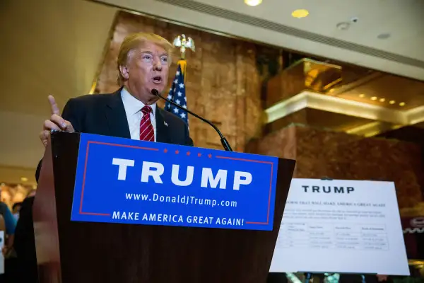 Republican presidential hopeful Donald Trump gives a speech outlining his vision for tax reform at his skyscraper on Fifth Avenue on September 28, 2015 in New York City. Under the plan there would be four tax categories, with people earning less than $25,000 per year paying 0% tax.