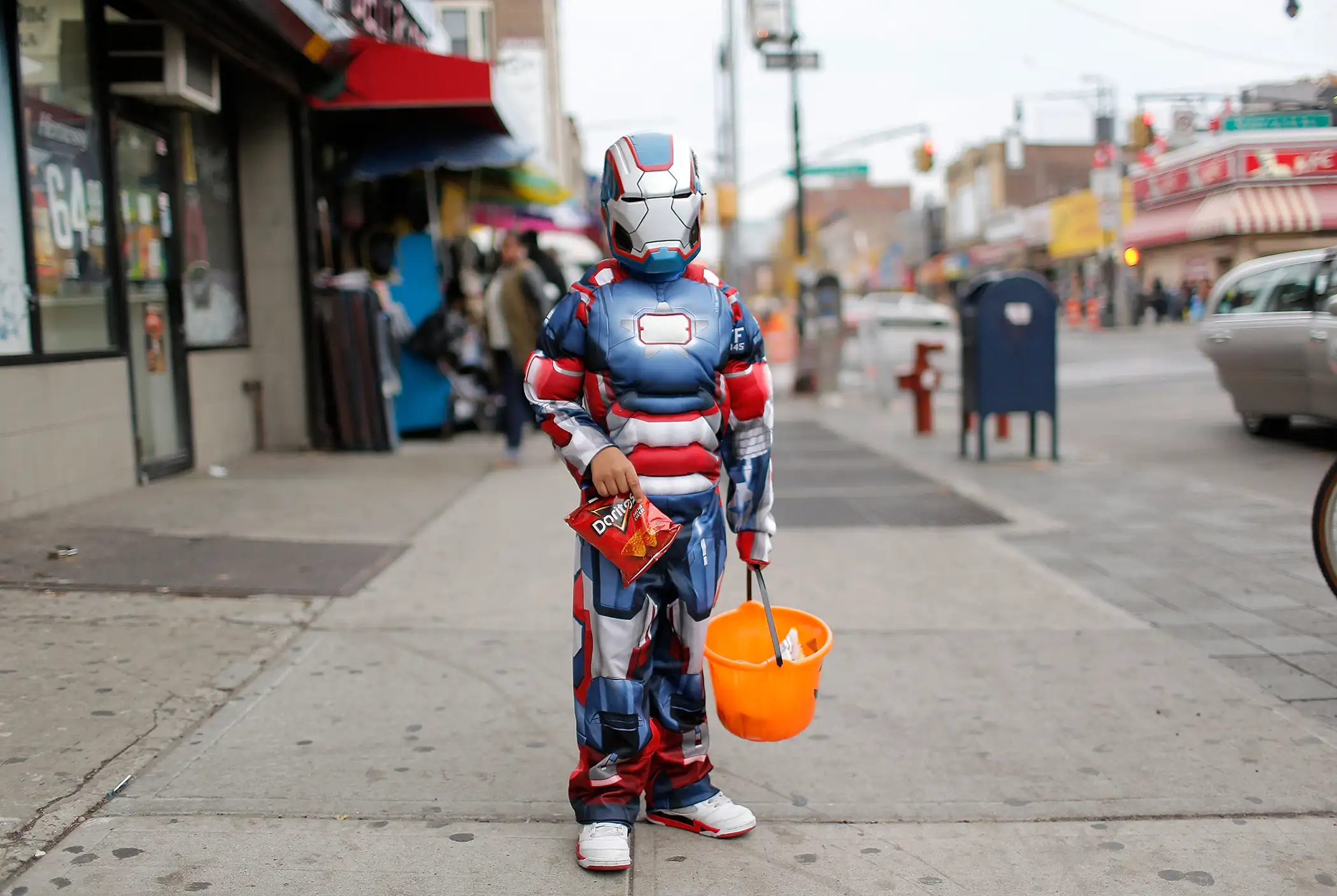 Ethan  of Bedford-Stuyvesant poses for a photo as he  Trick or Treats  in Bedford-Stuyvesant, Brooklyn on October 31, 2013 in New York City.