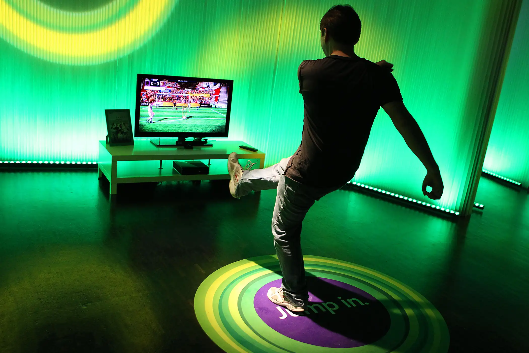 A man checks out Microsoft's new Xbox 360 equipped with 'Kinect' kinetic controller at the Gamescom trade fair in Cologne, Germany, on August 17, 2010.