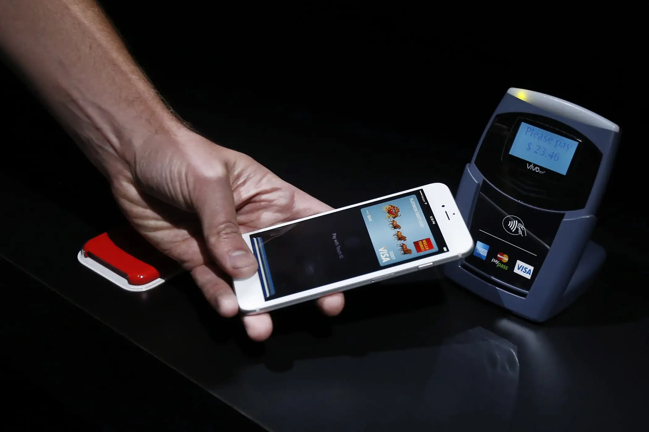 Demonstration on how the new Apple Pay works during Apple's launch event at the Flint Center for the Performing Arts in Cupertino, California, September 9, 2014.