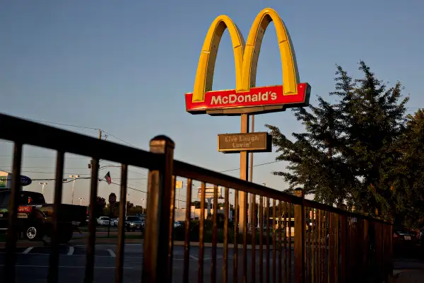 A McDonald's sign stands outside of a restaurant in Peru, Illinois on July 20, 2015.