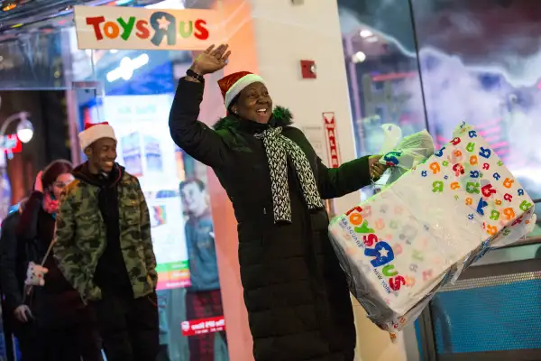 People enter the Toys R Us in Times Square at 5PM to begin shopping on November 27, 2014 in New York, United States.