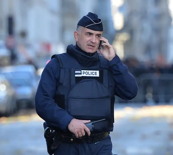 People lay flowers for Paris terror attacks victims