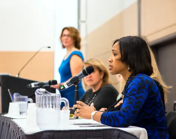 Lazetta Rainey Braxton addresses FPA attendees. Also pictured: Rachel F. Elson, standing, and Diane Harris.