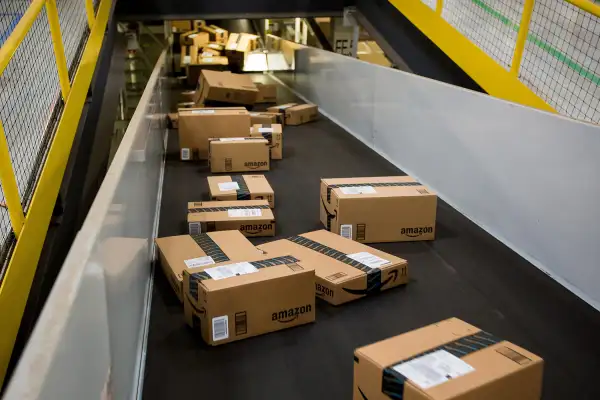 Boxes move along a conveyor belt at the Amazon.com fulfillment center on Cyber Monday in Robbinsville, New Jersey, on November 30, 2015.