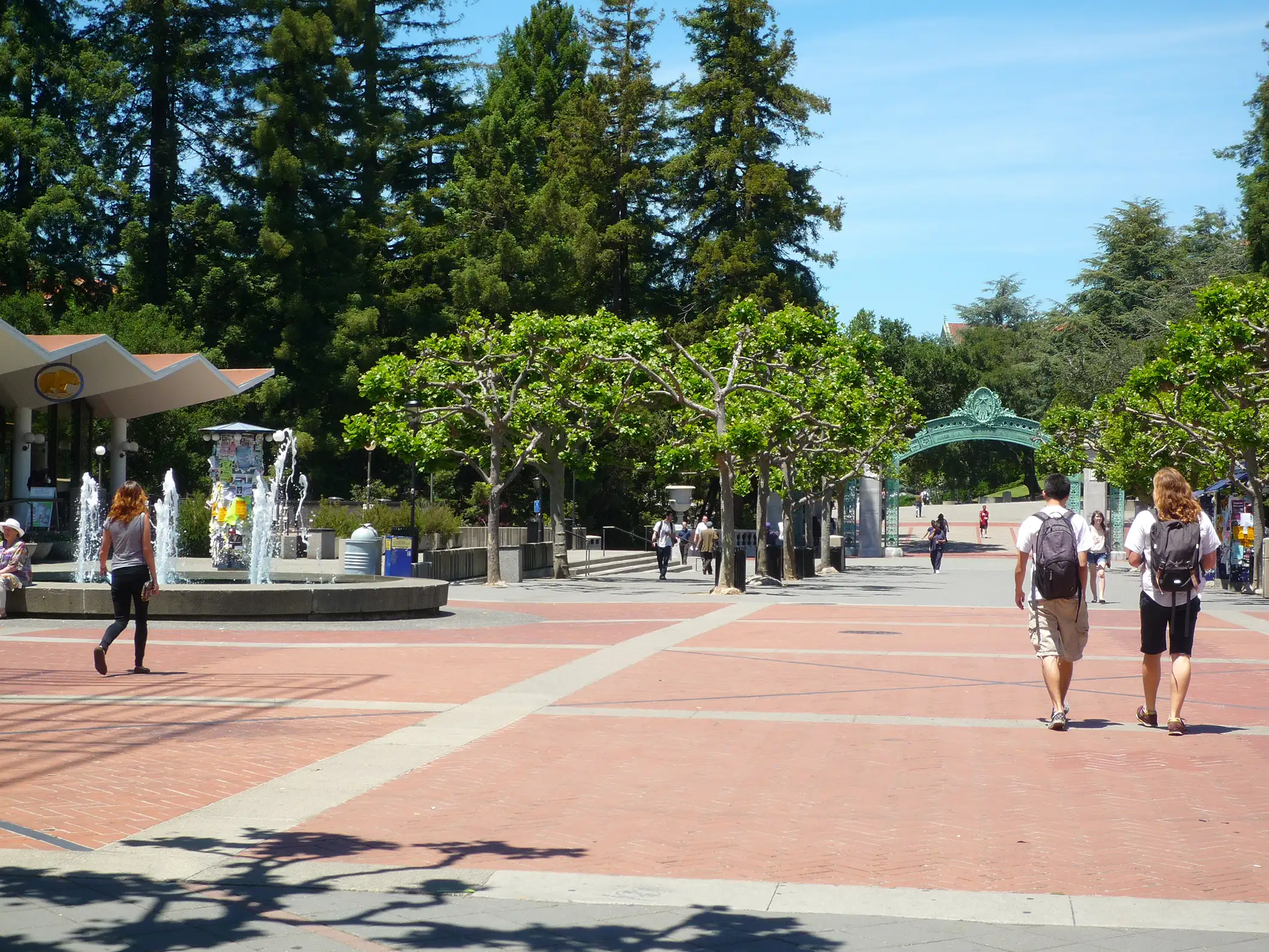 Students walking on Sproul Plaza, Sather Gate in back, University of California-Berkeley