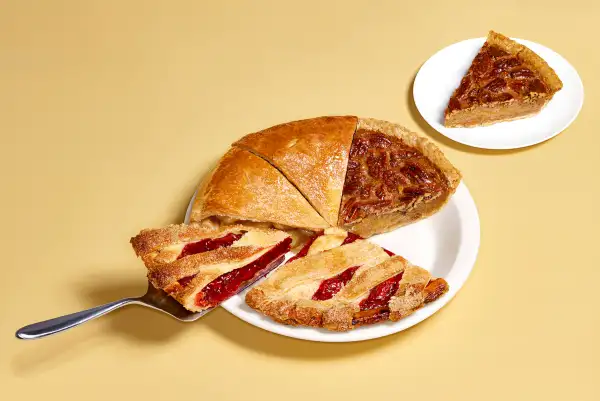 slice of pie being taken from mismatched pie